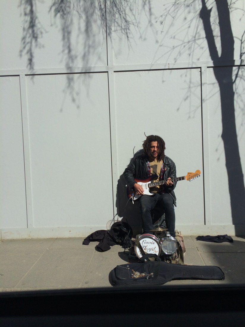 Only person on the sidewalk of Portobello Road (because everyone else was walking on the street) was this busker (I learned that term on this trip, actually... and have heard it again since).