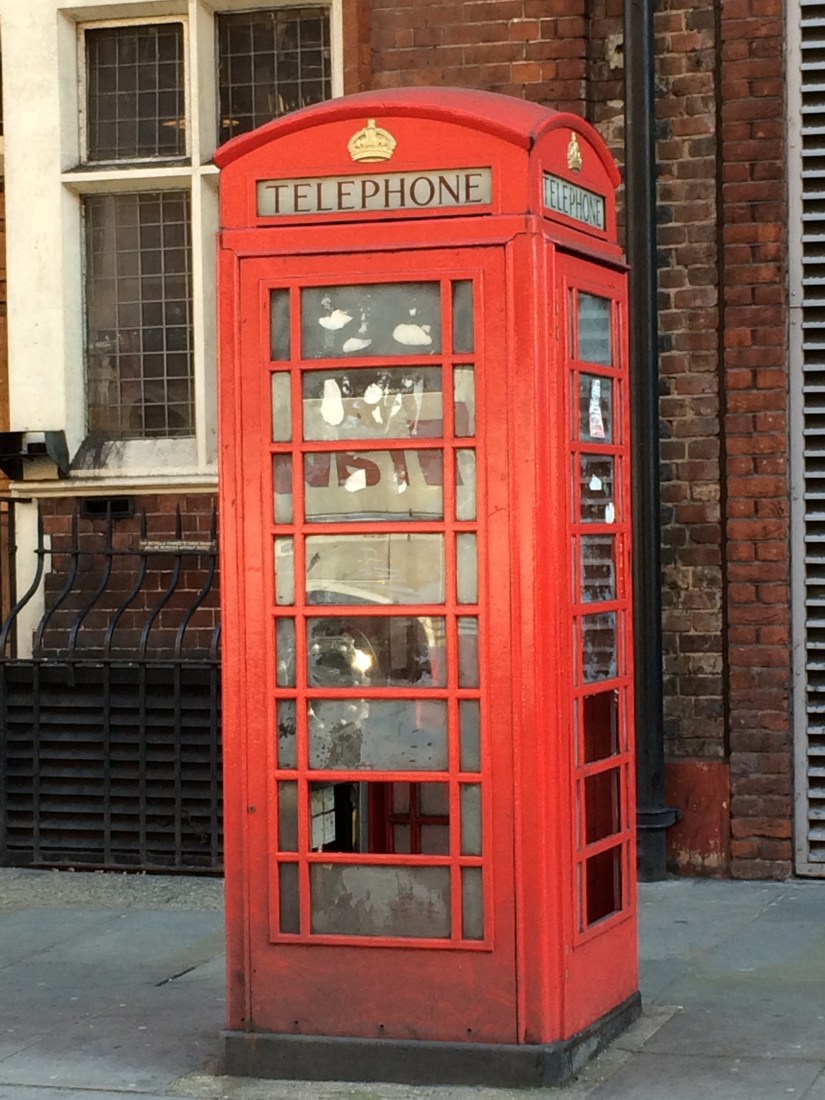 I had to take a picture of a telephone booth.  They're so rare now!